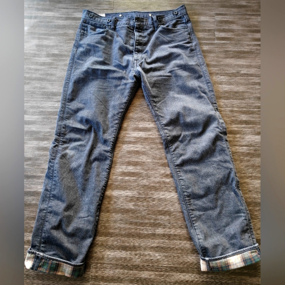 Vintage rare flannel lined black Levi jeans 34x34